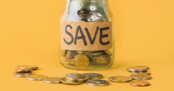 Money saving jar with coins